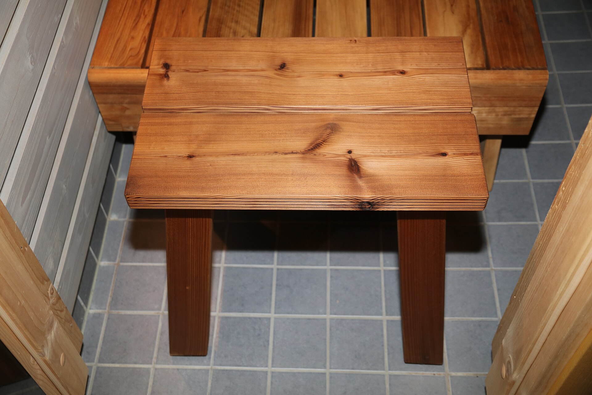Wooden benches inside a Finnish sauna